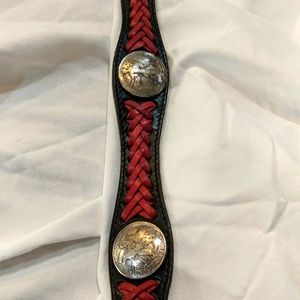 Handcrafted belt with silver inlays